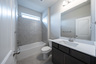 guest bathroom with soaking tub