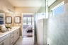 primary bathroom with large walk-in shower