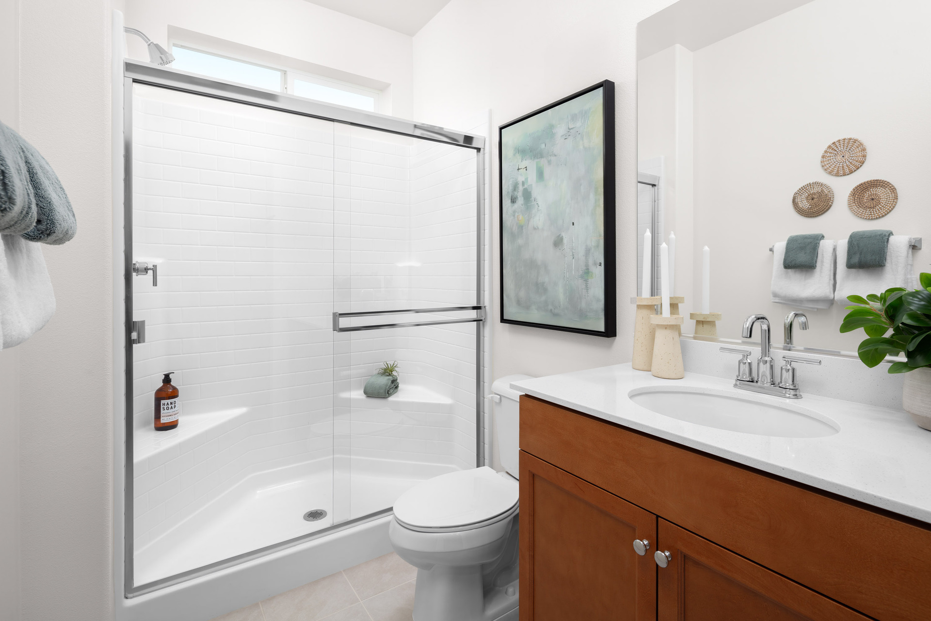 bathroom with neutral floors and white countertops