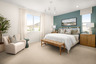 primary bedroom with neutral carpet and large windows
