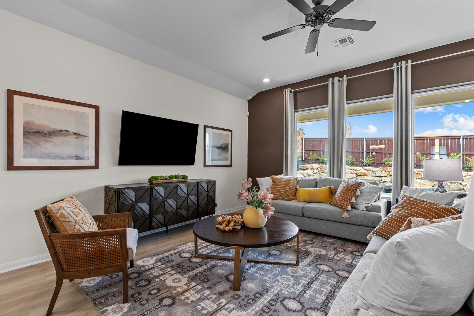 great room with rug, couches & large windows
