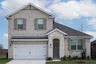 exterior of home with tan brick and white stone