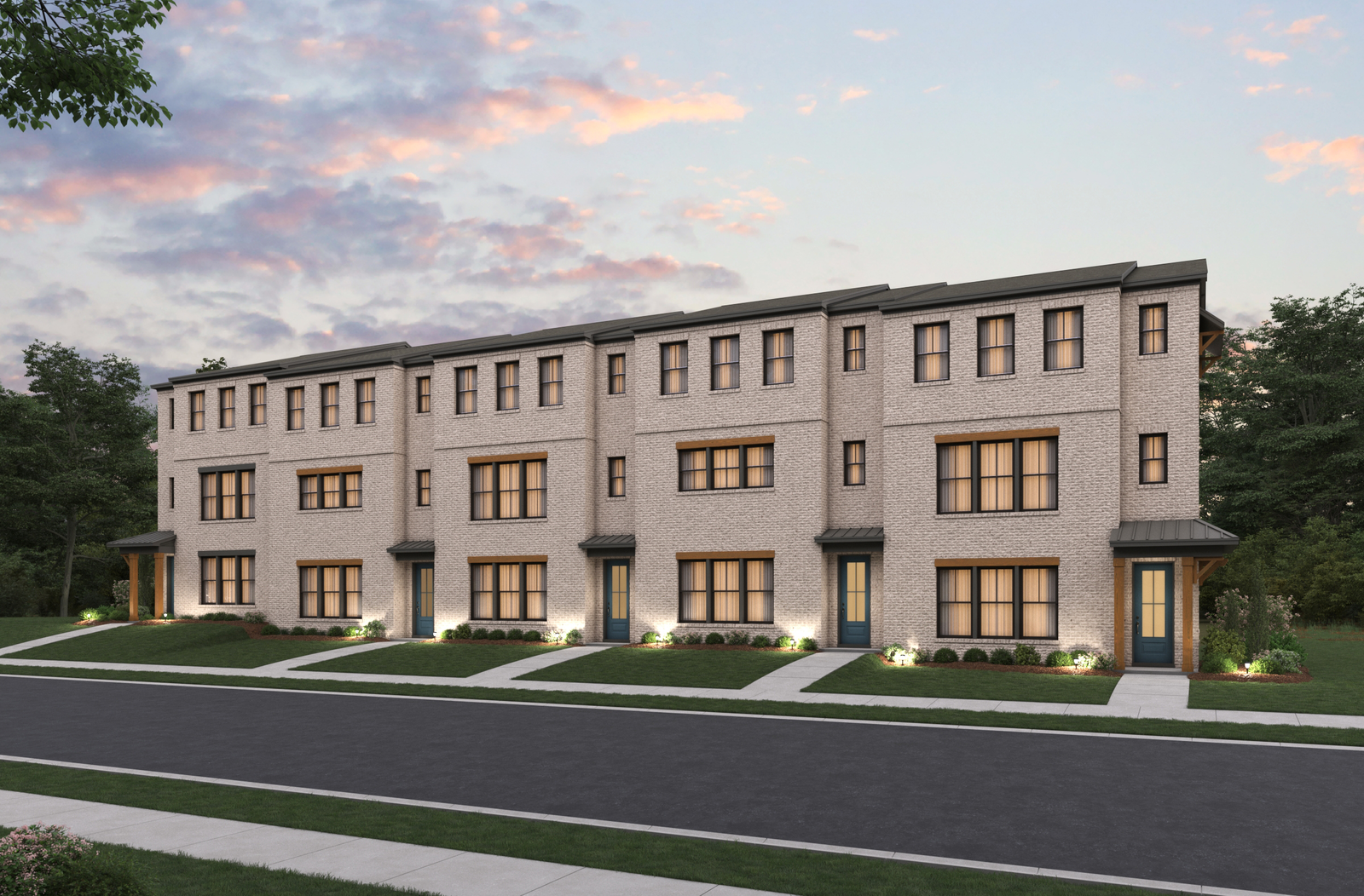 front of rear-load townhome building with brick