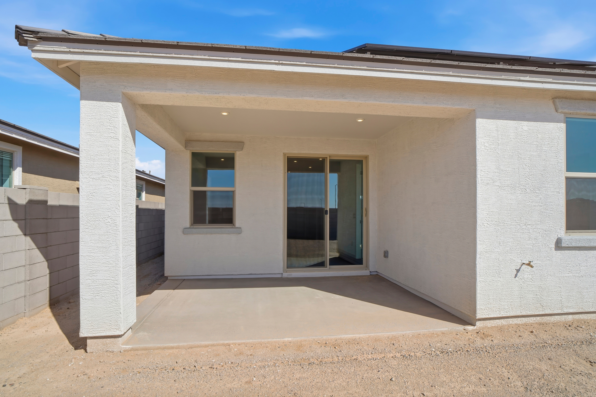 spacious covered patio with recessed lights