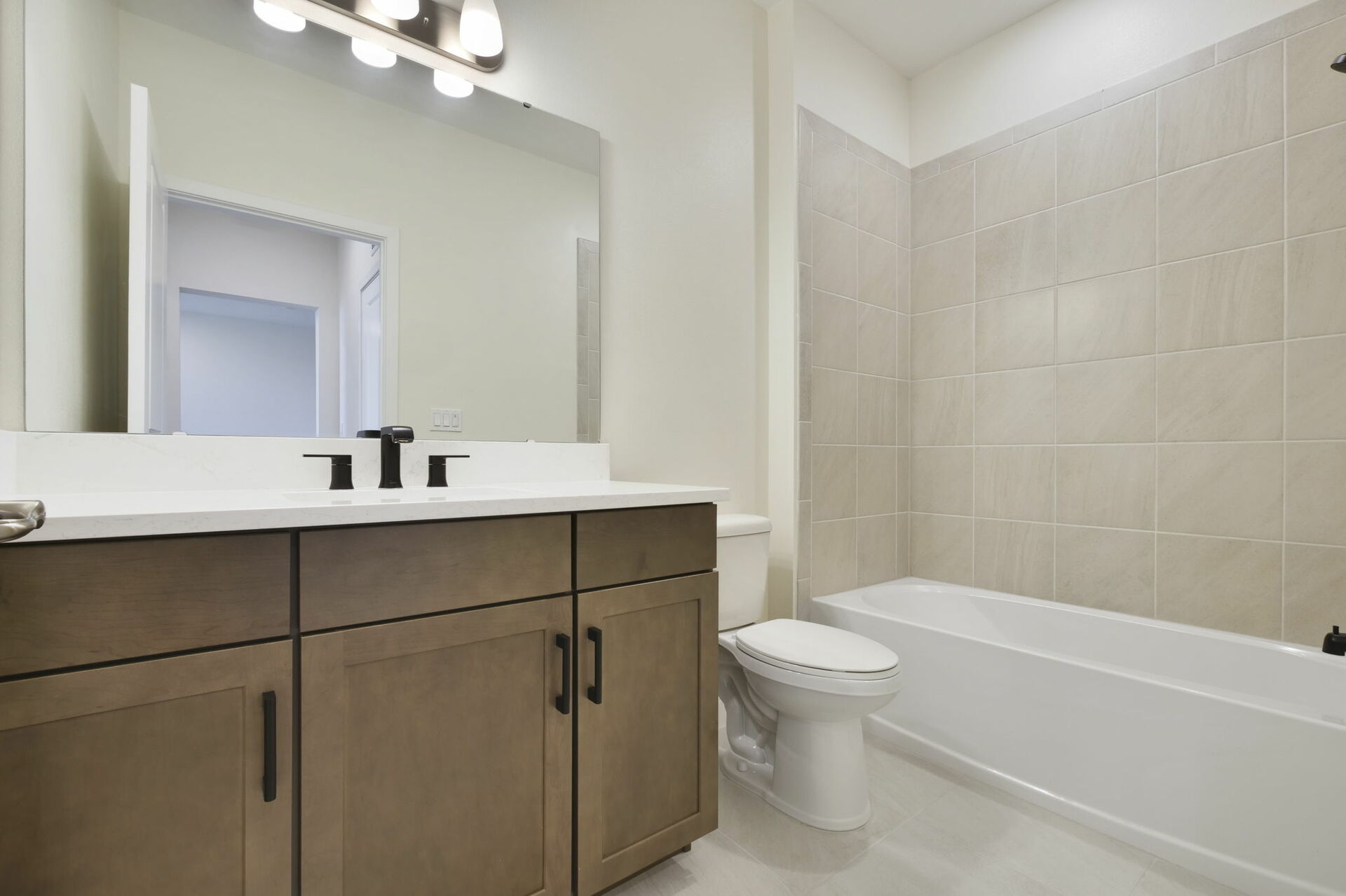 single-sink vanity, water closet and shower