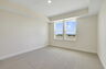 carpet throughout, tray ceiling with dual windows