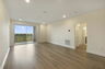 room with view of the kitchen and access to the cover patio