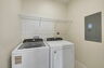 washer and dryer with storage above