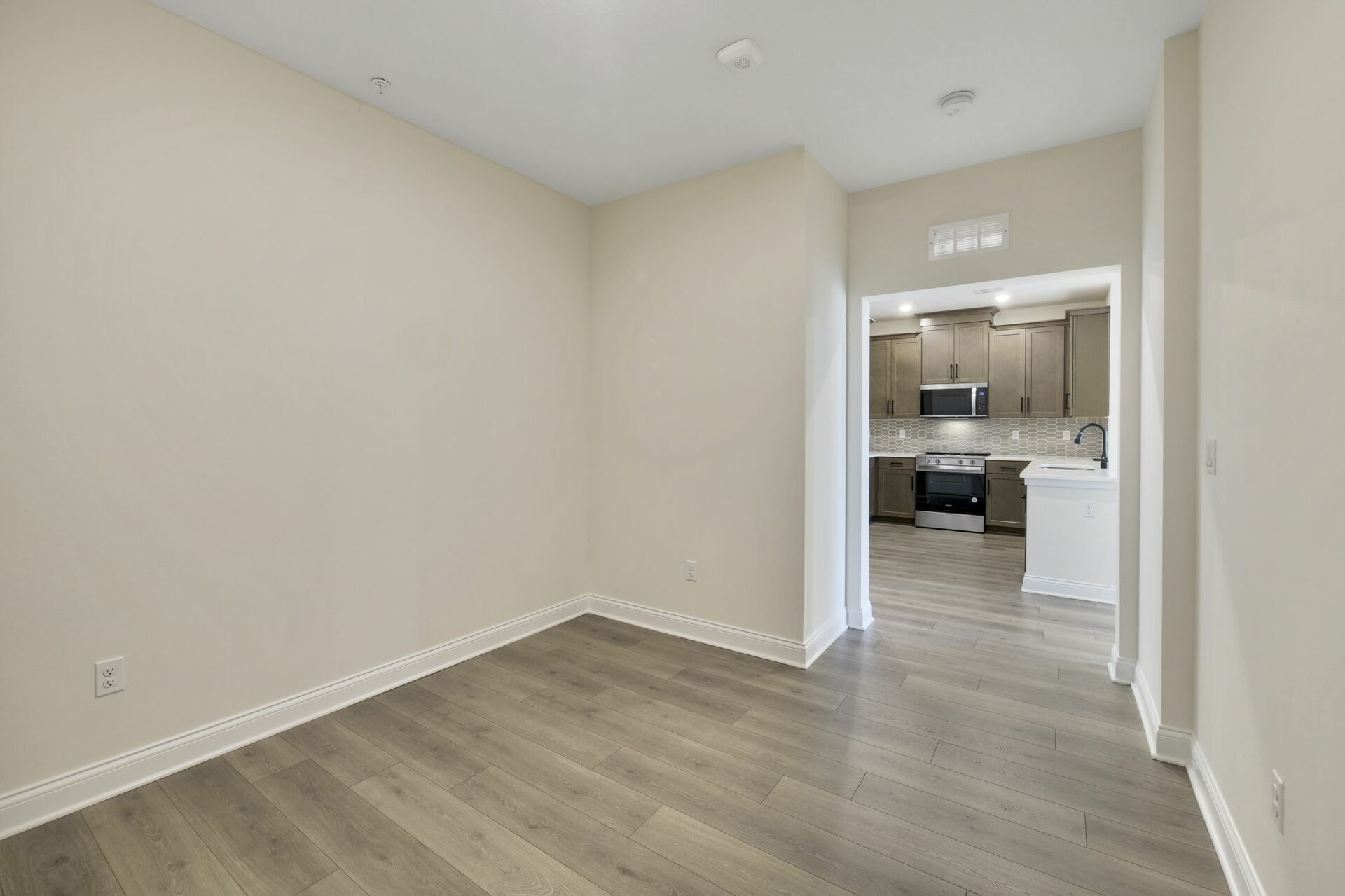 room with access to the kitchen