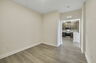 room with access to the kitchen