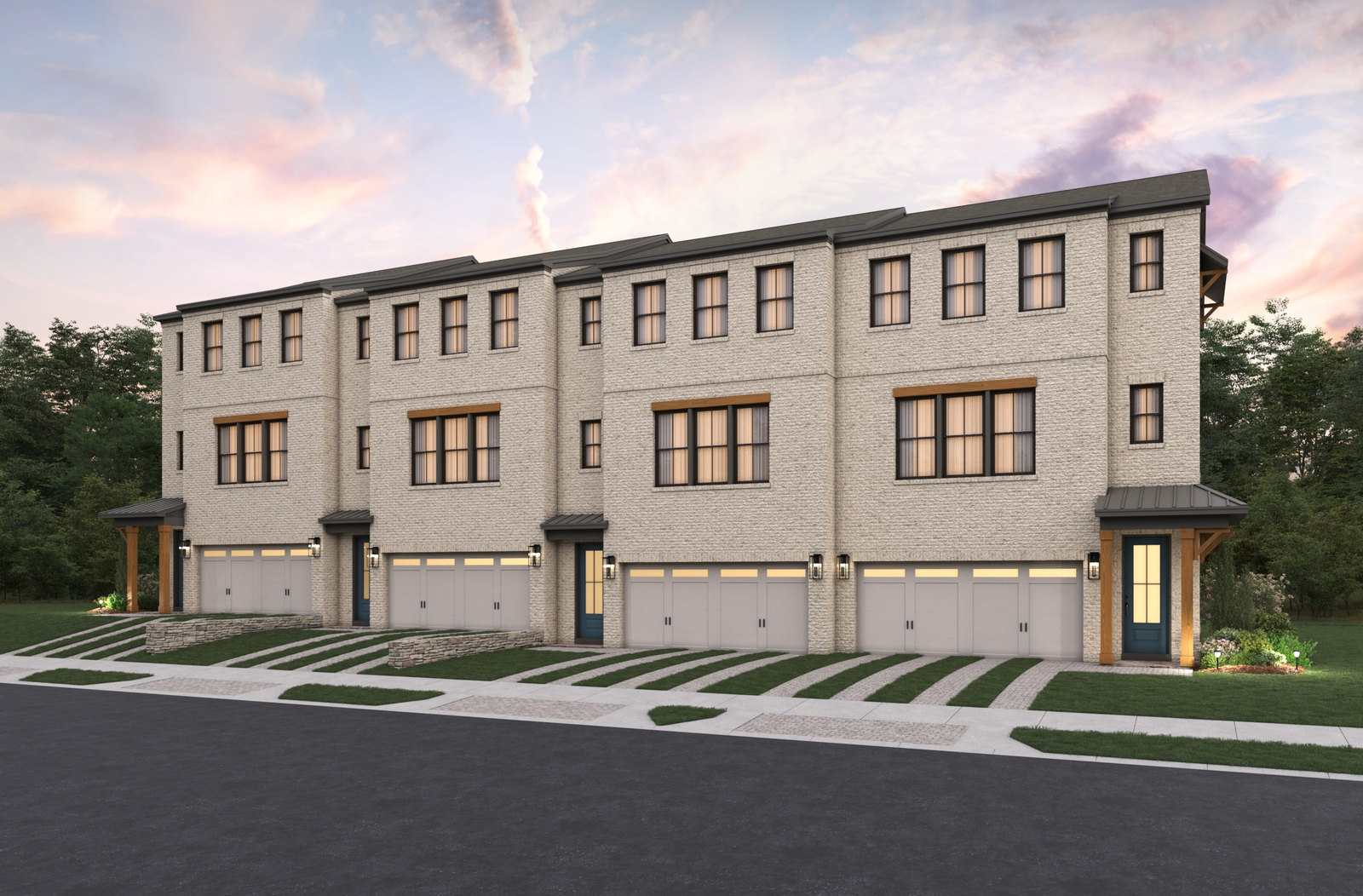 front of front-load townhome building with brick