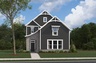 exterior rendering with slate gray hardie plank, stone accent, and white trim