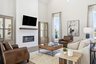 great room with two-story ceilings