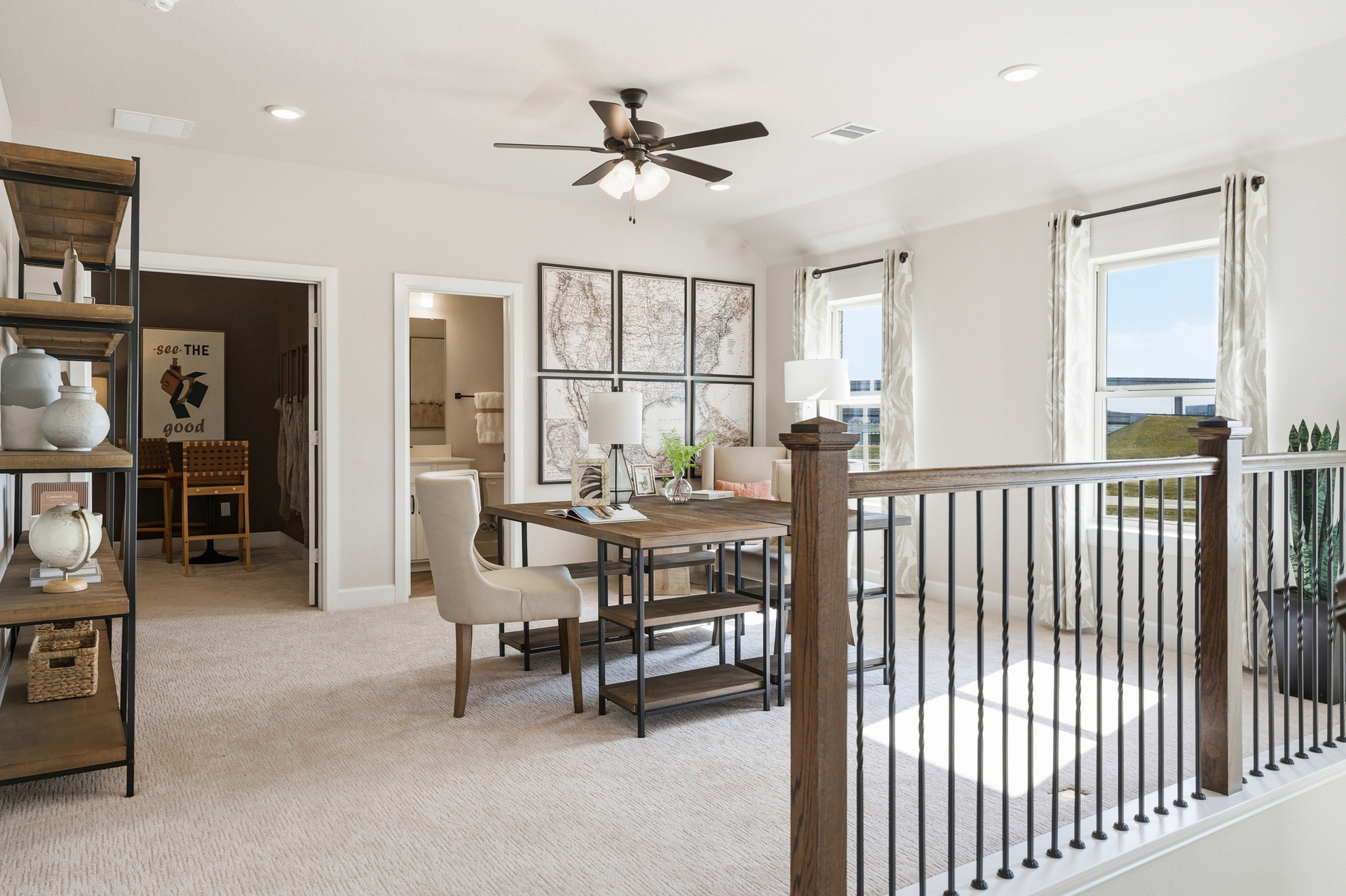 open loft with carpet and windows