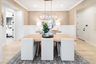 dining room with wood floors, wooden table, and chandelier