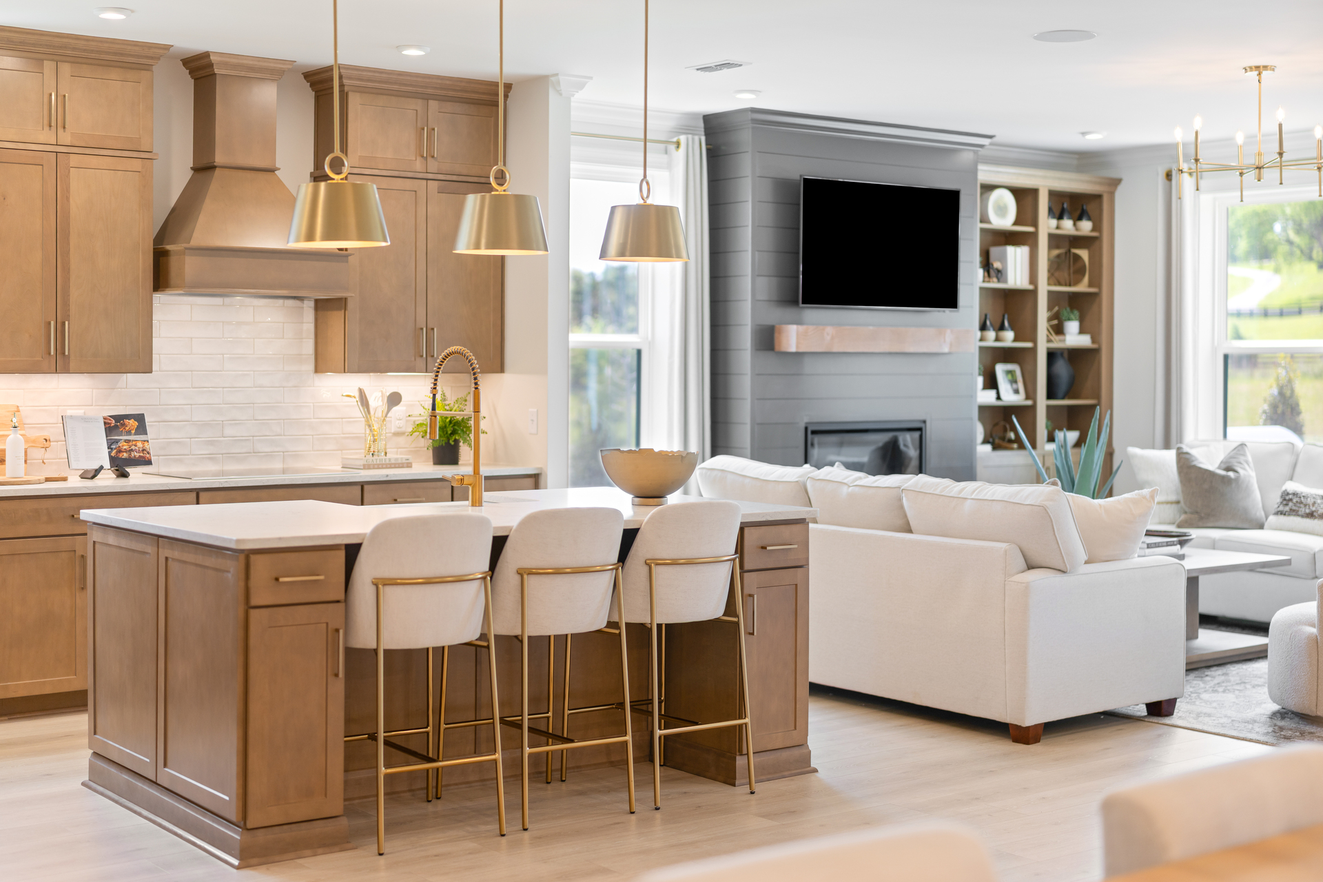 kitchen with wooden cabinets, an induction oven, and island