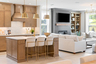 kitchen with wooden cabinets, an induction oven, and island
