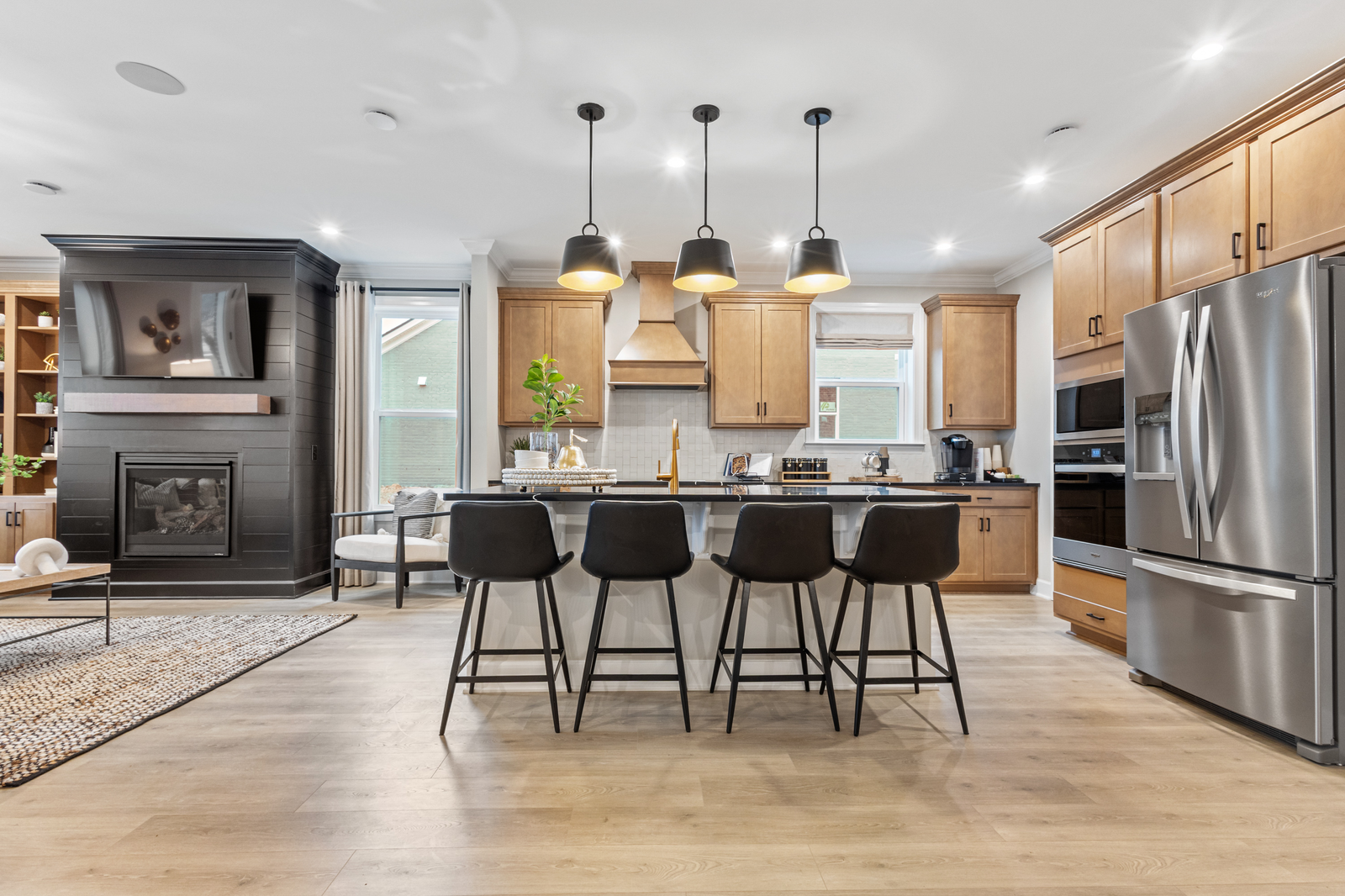 kitchen with hardwood floors and large island
