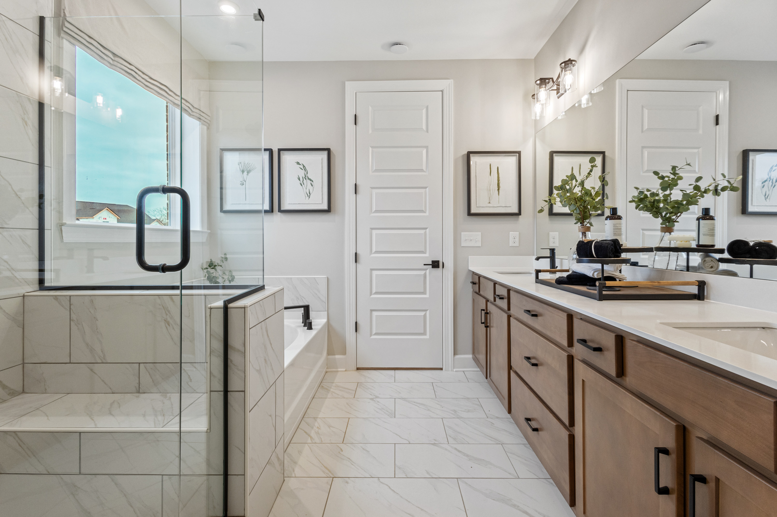 marble bathroom with shower, bathtub, and vanity