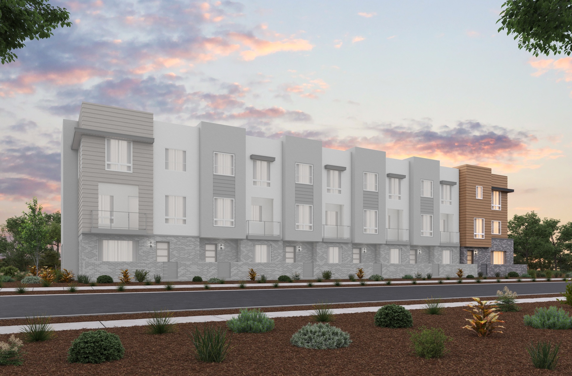 front exterior of modern gray & brown 3-story townhome building