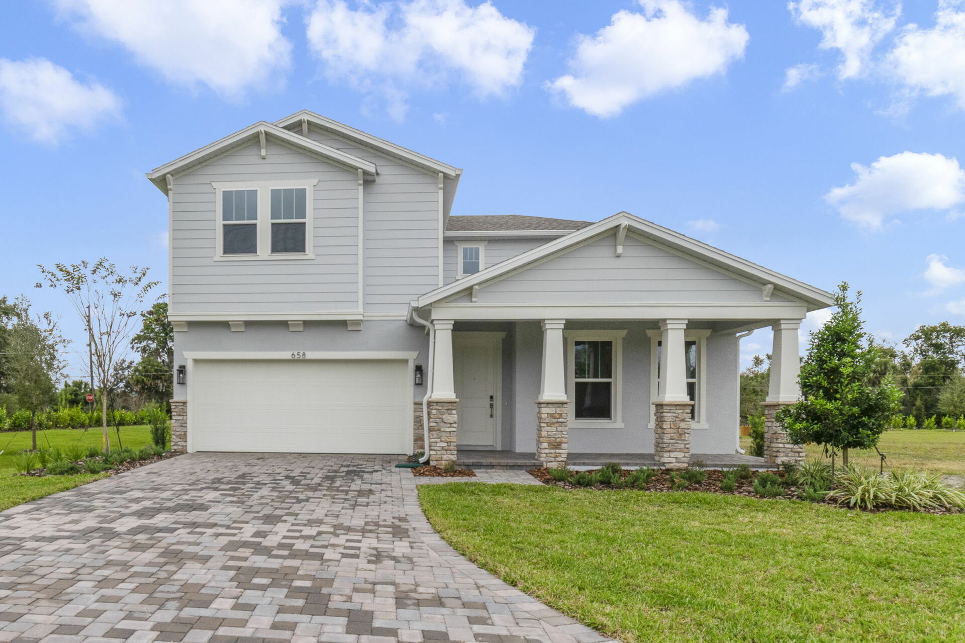 front exterior of home with stone accents