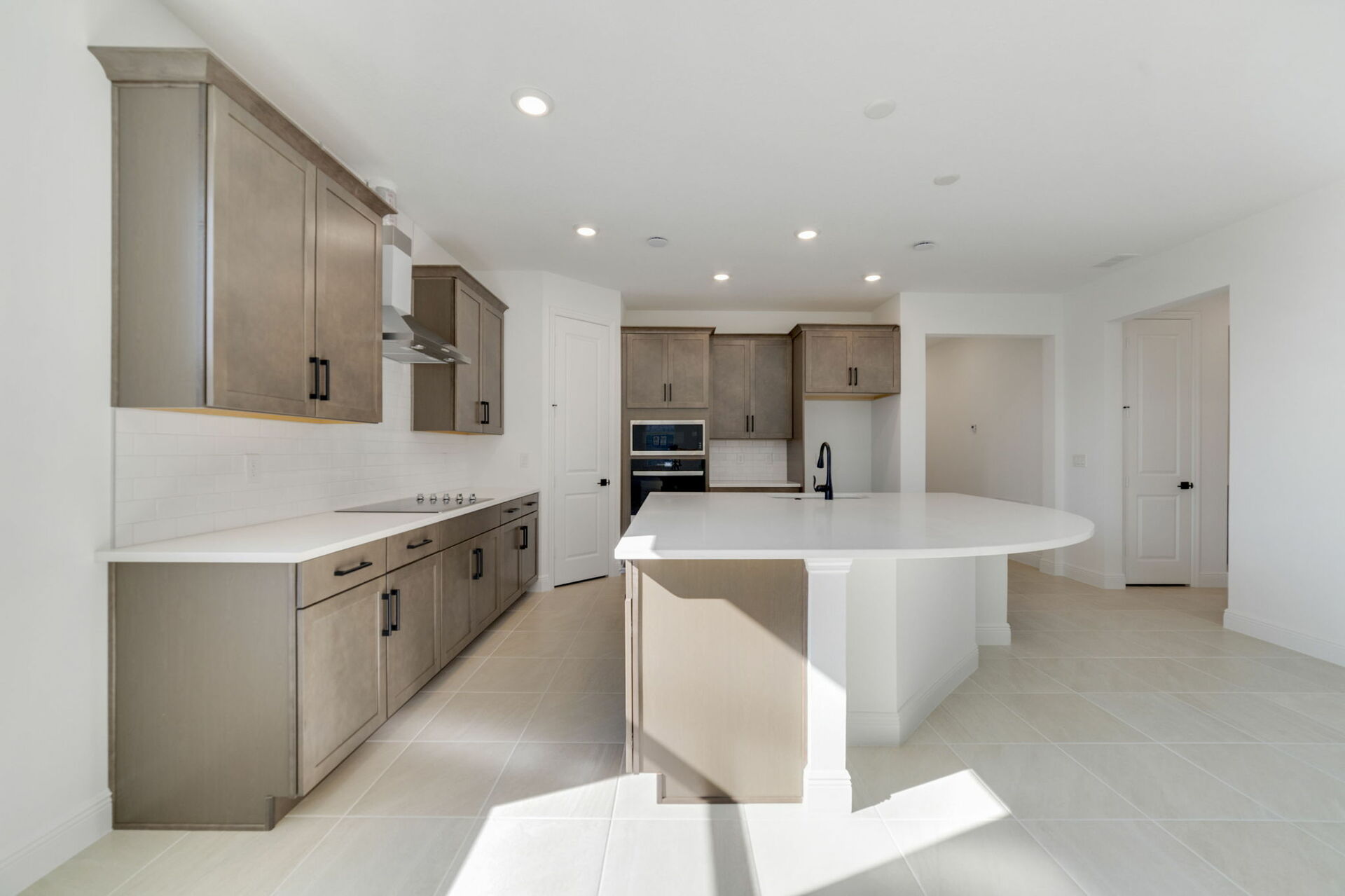 kitchen with view of island and view of great room