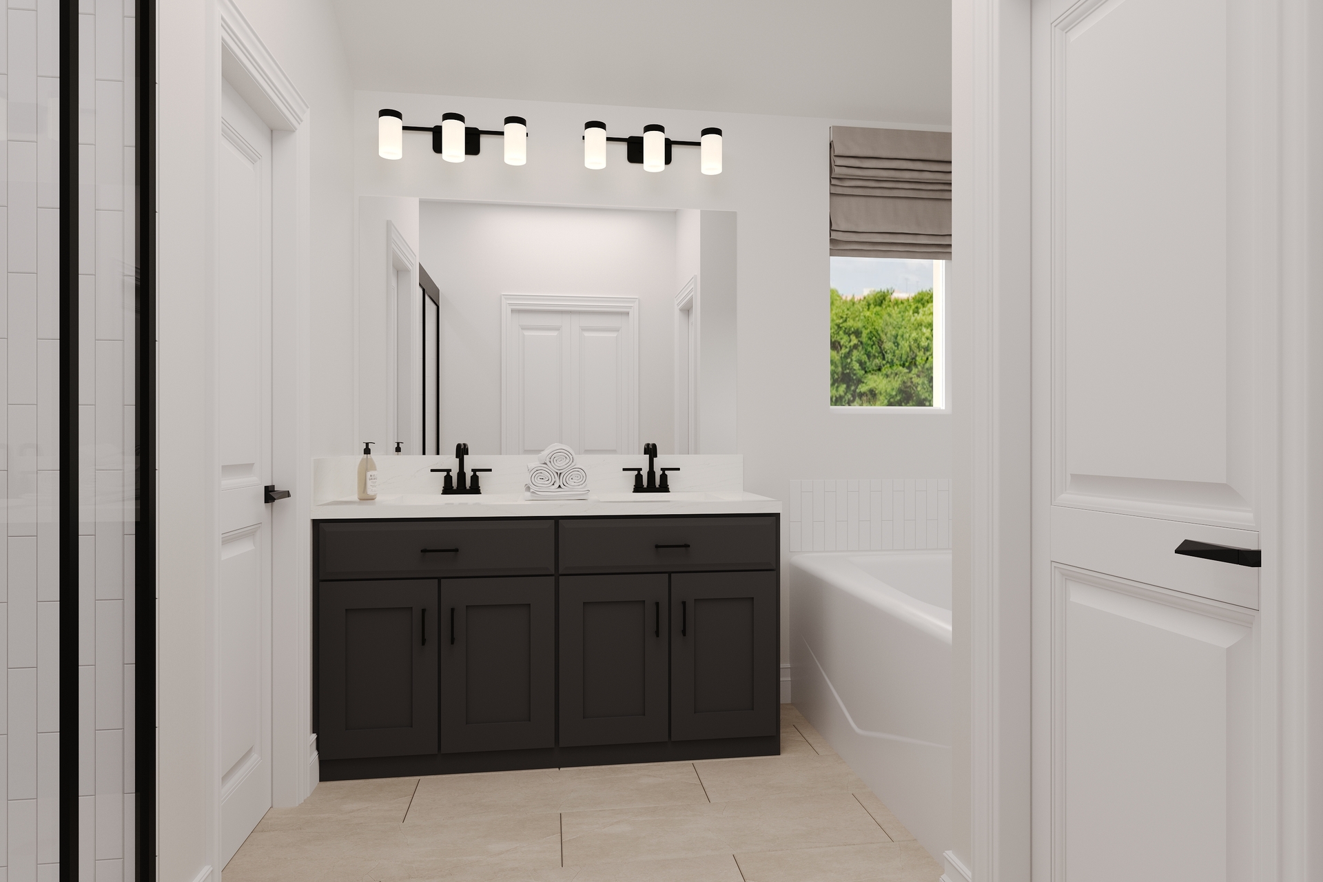 primary bathroom with tile flooring and double sinks
