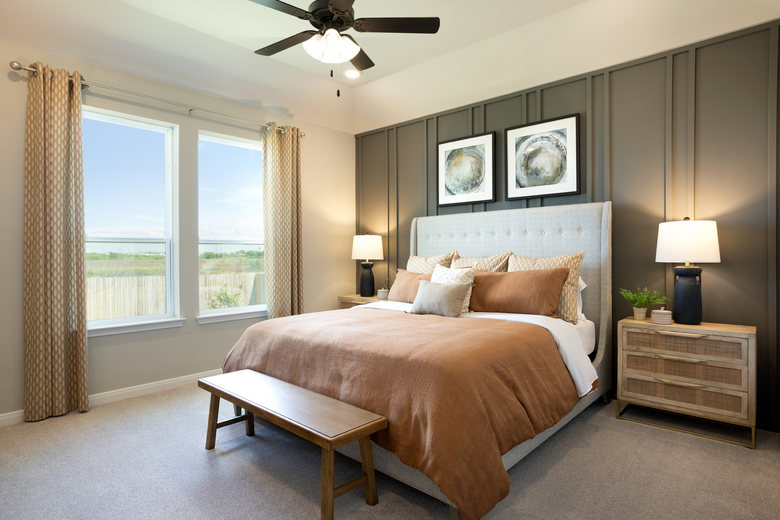 bedroom with black accent wall & carpet