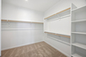 spacious walk-in closet for extra storage