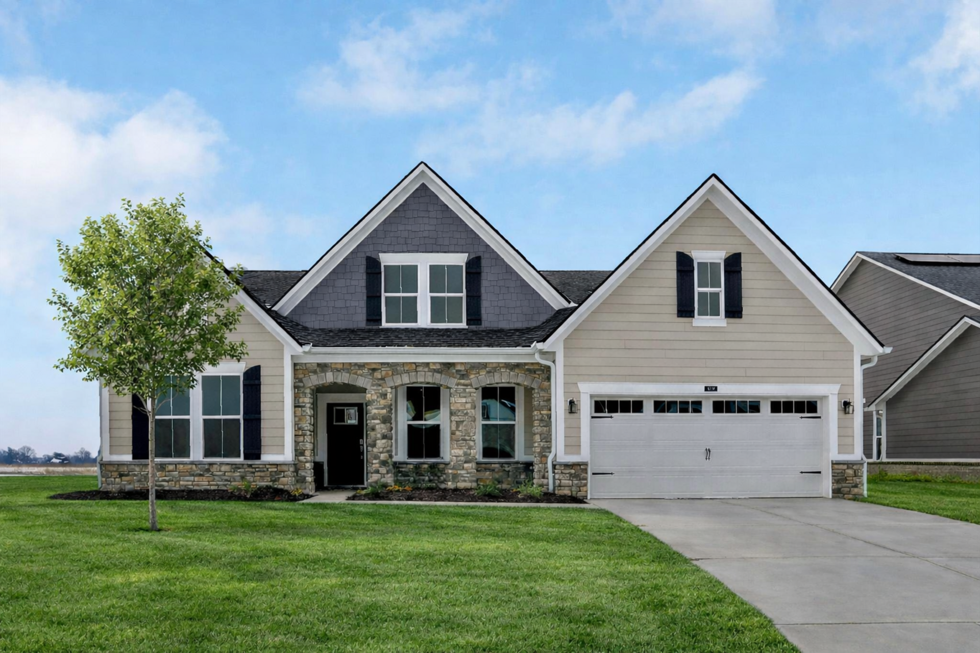 front exterior of home with stone details and covered front porch
