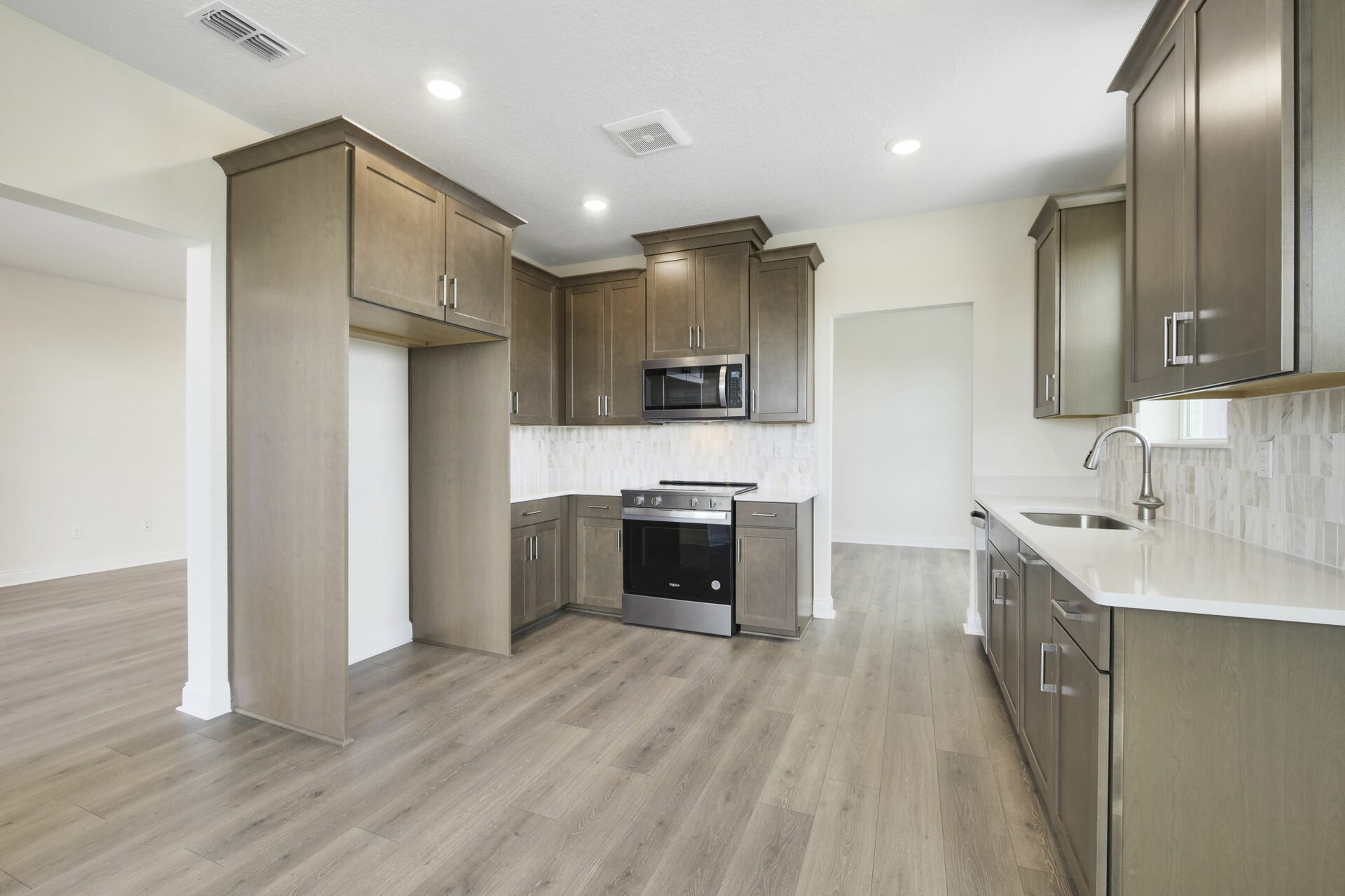 hardwood cabinetry and stainless-steel appliances 