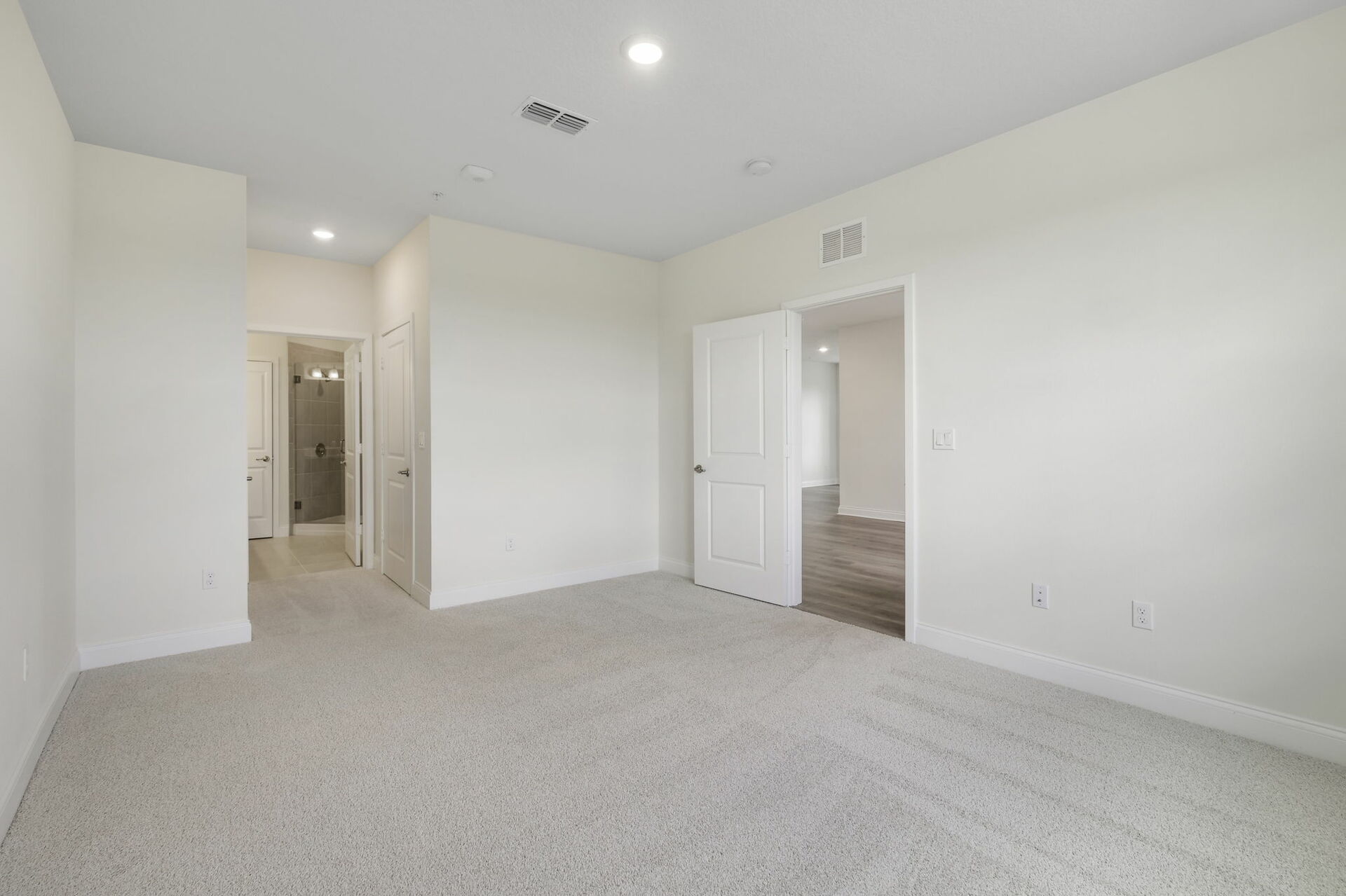 carpet throughout and large windows