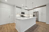 kitchen with white cabinets and countertops