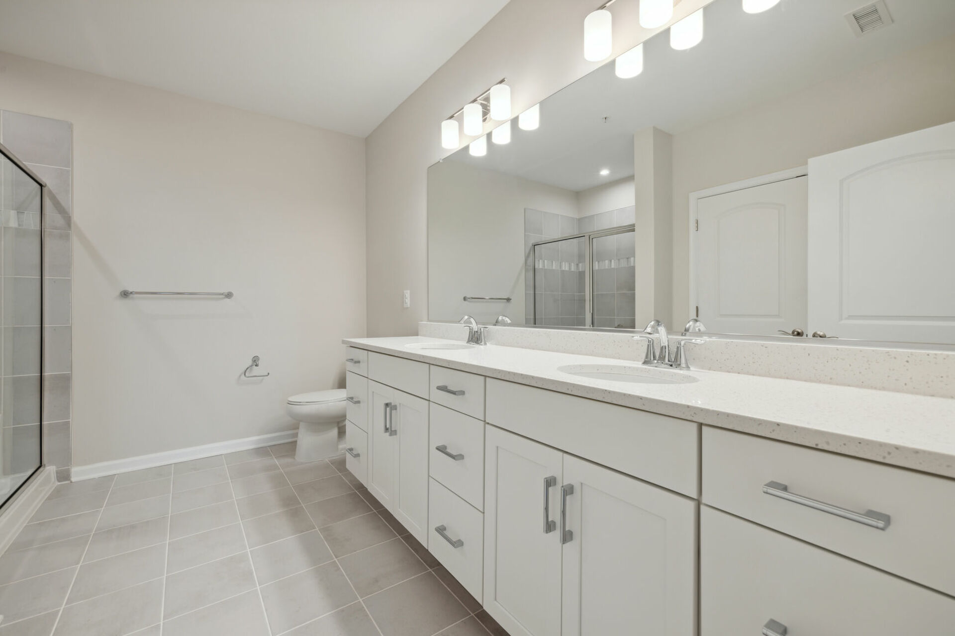 primary bath with dual vanities