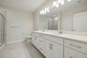 primary bath with dual vanities