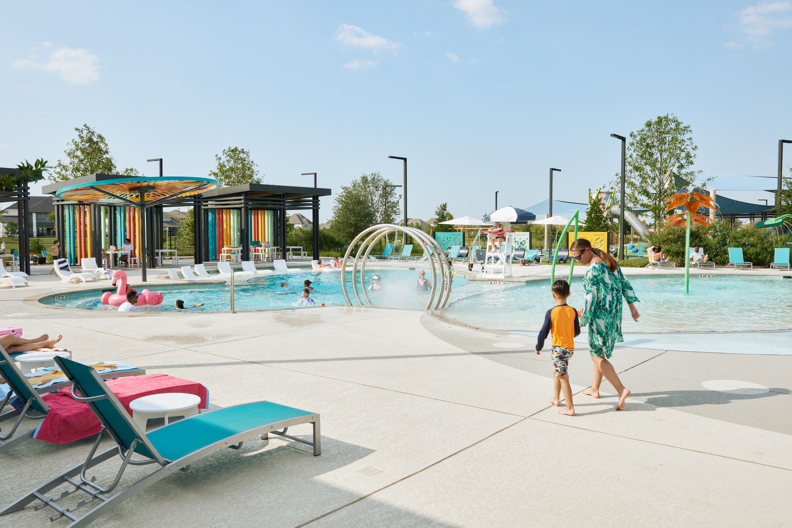 community pool with lounge chair