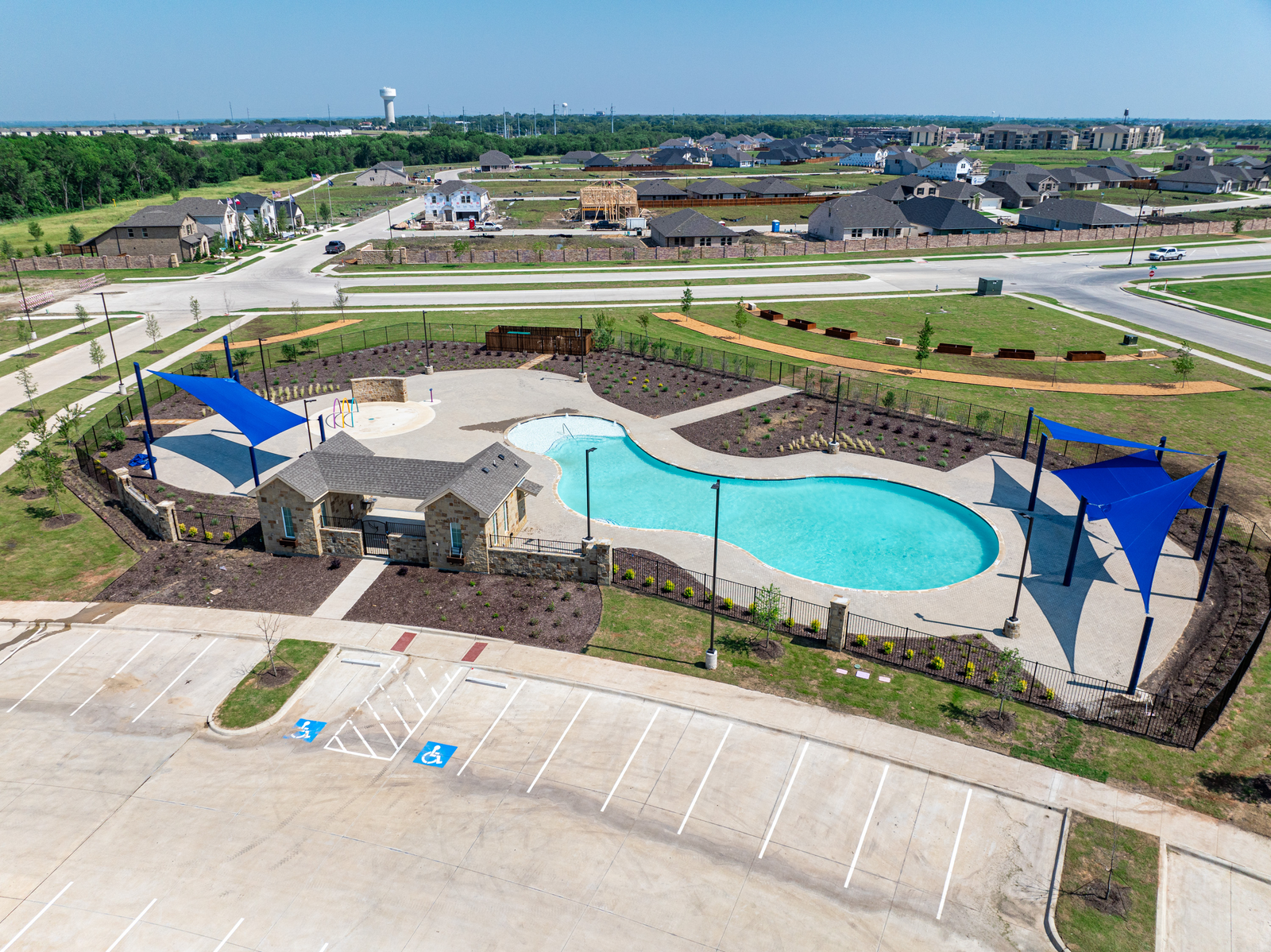 community pool with sun shades