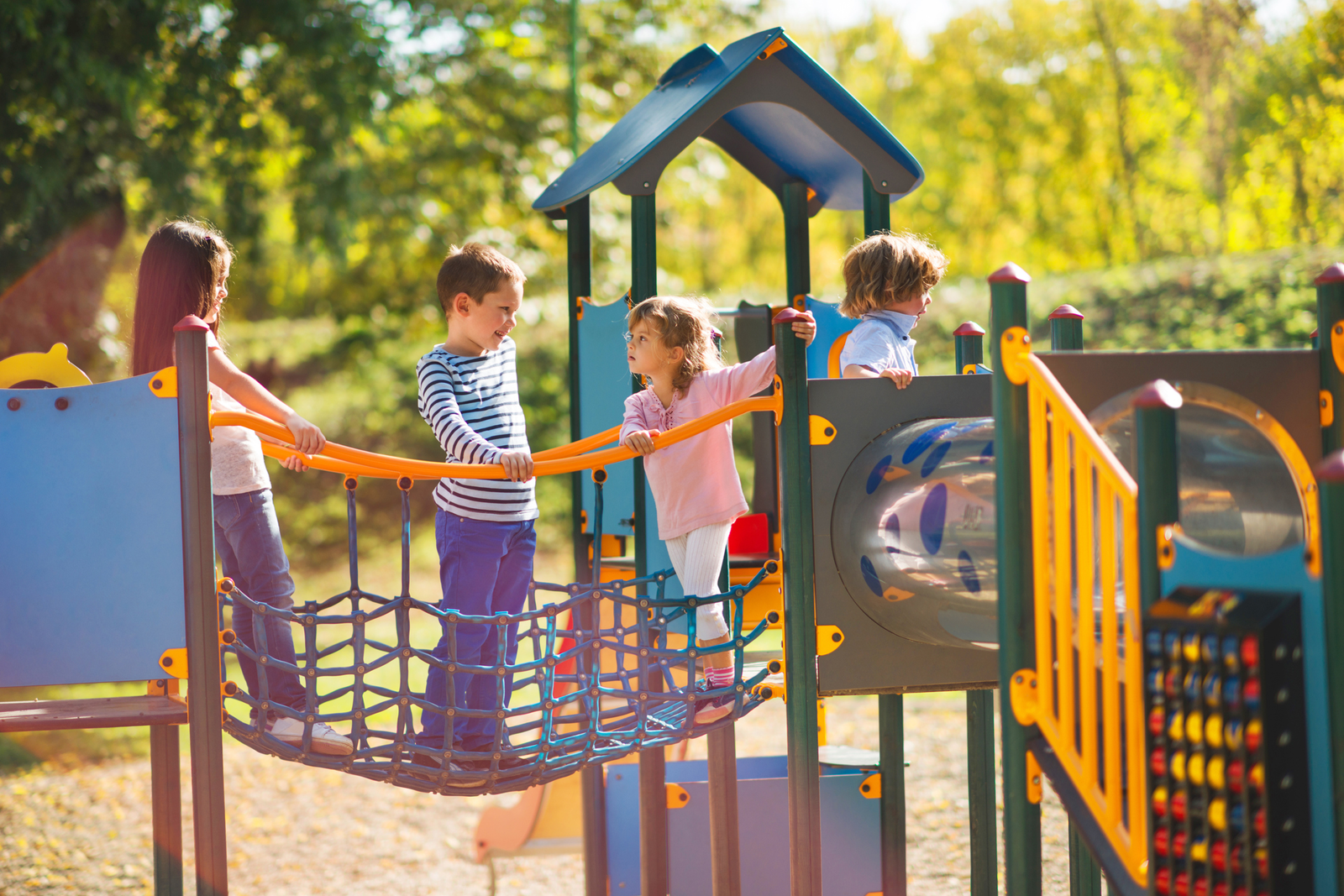 kids playing on a playground 