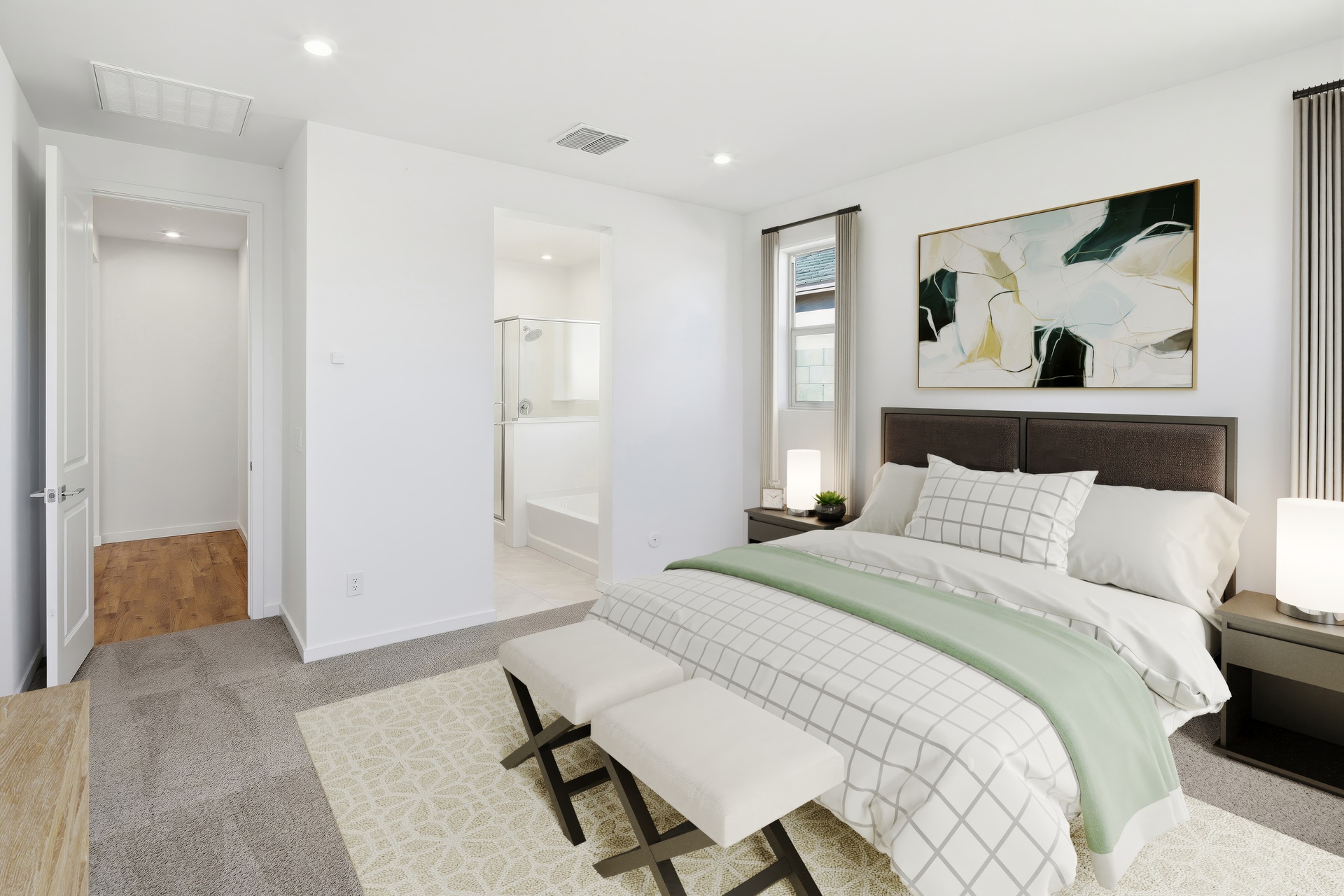 spacious room with a large couch, white grid pattern covers, and a white bed bench