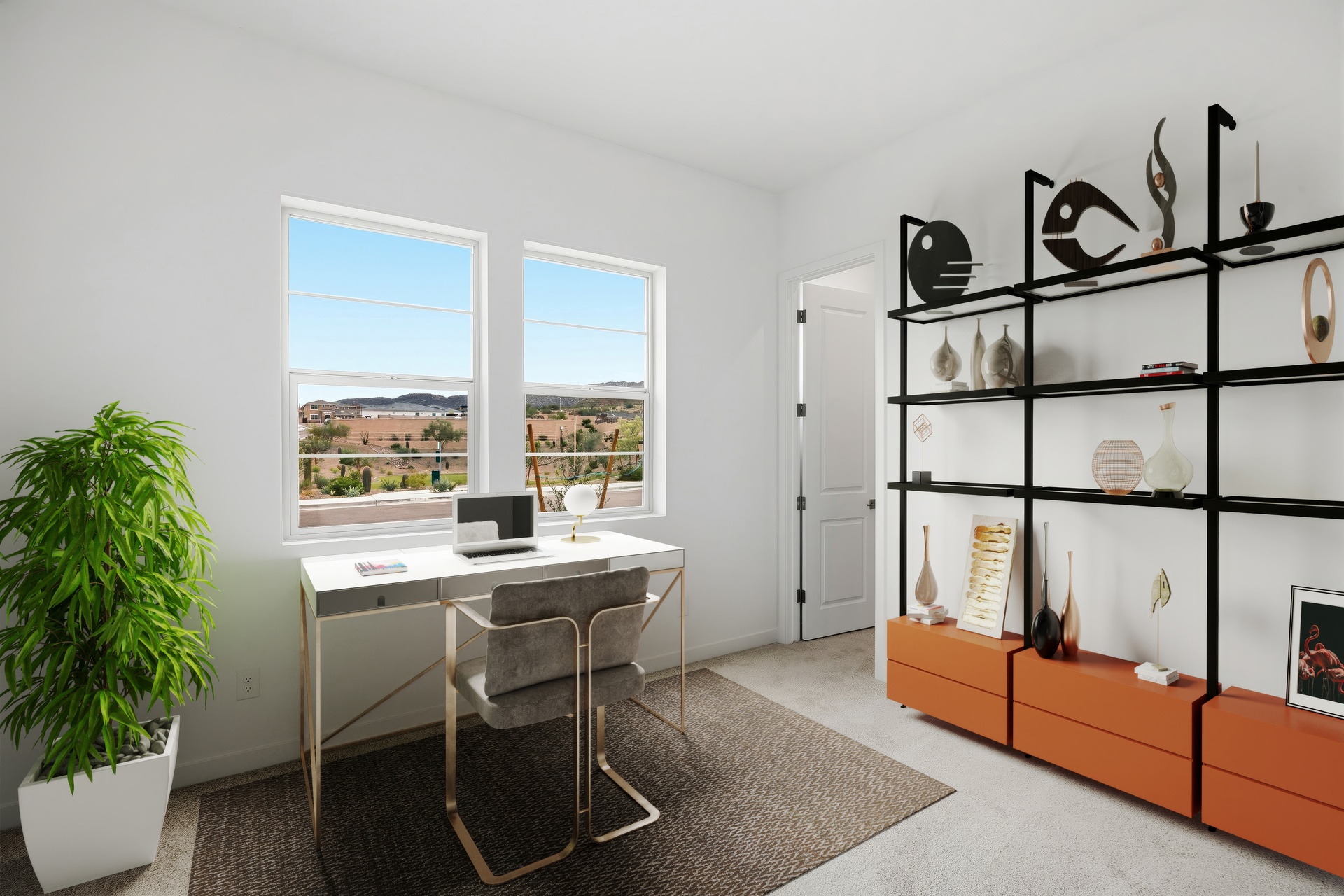 bedroom used as home office with desk, chair, and office plant