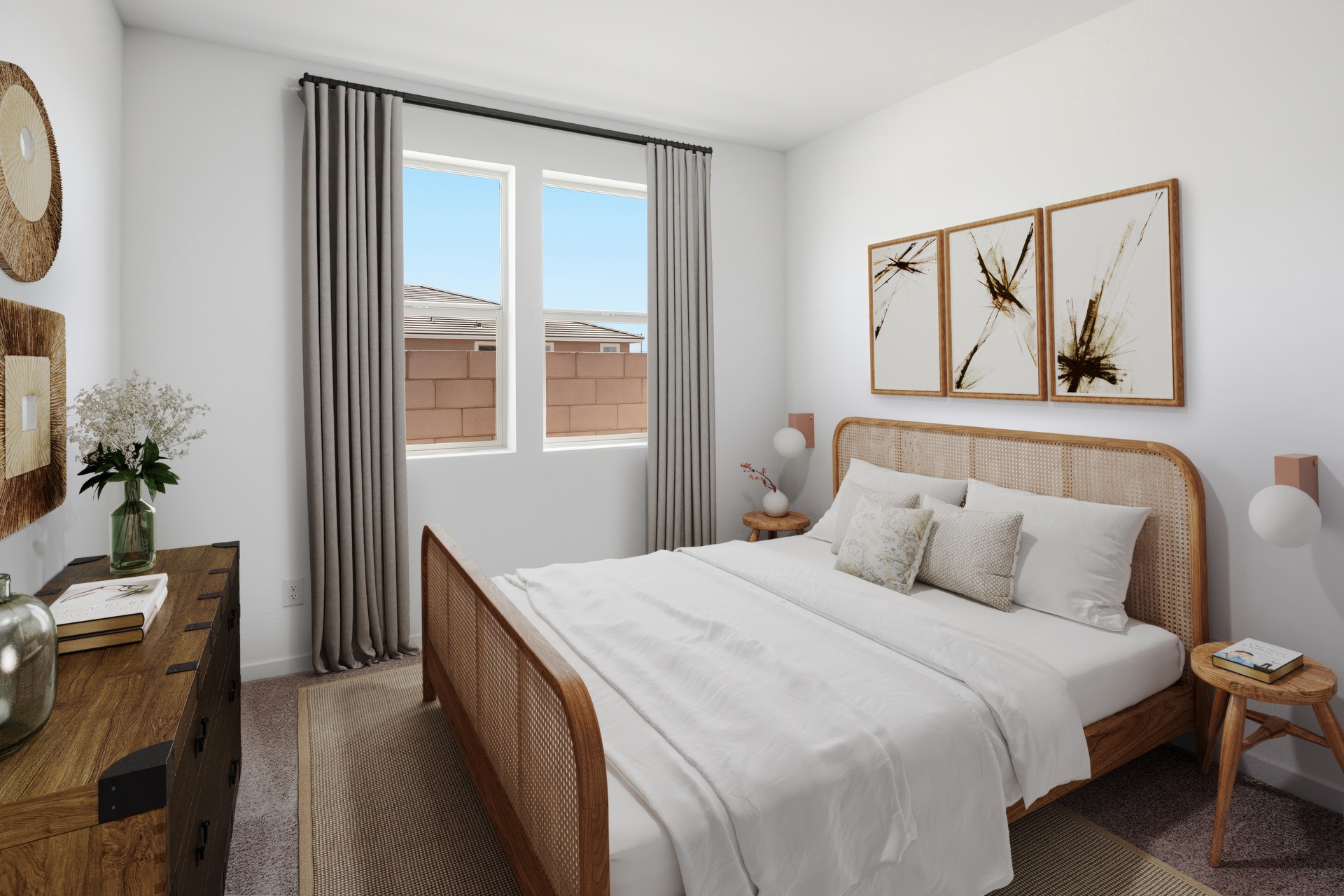 bedroom with an oak bedframe, white bed covers, and a wooden dresser