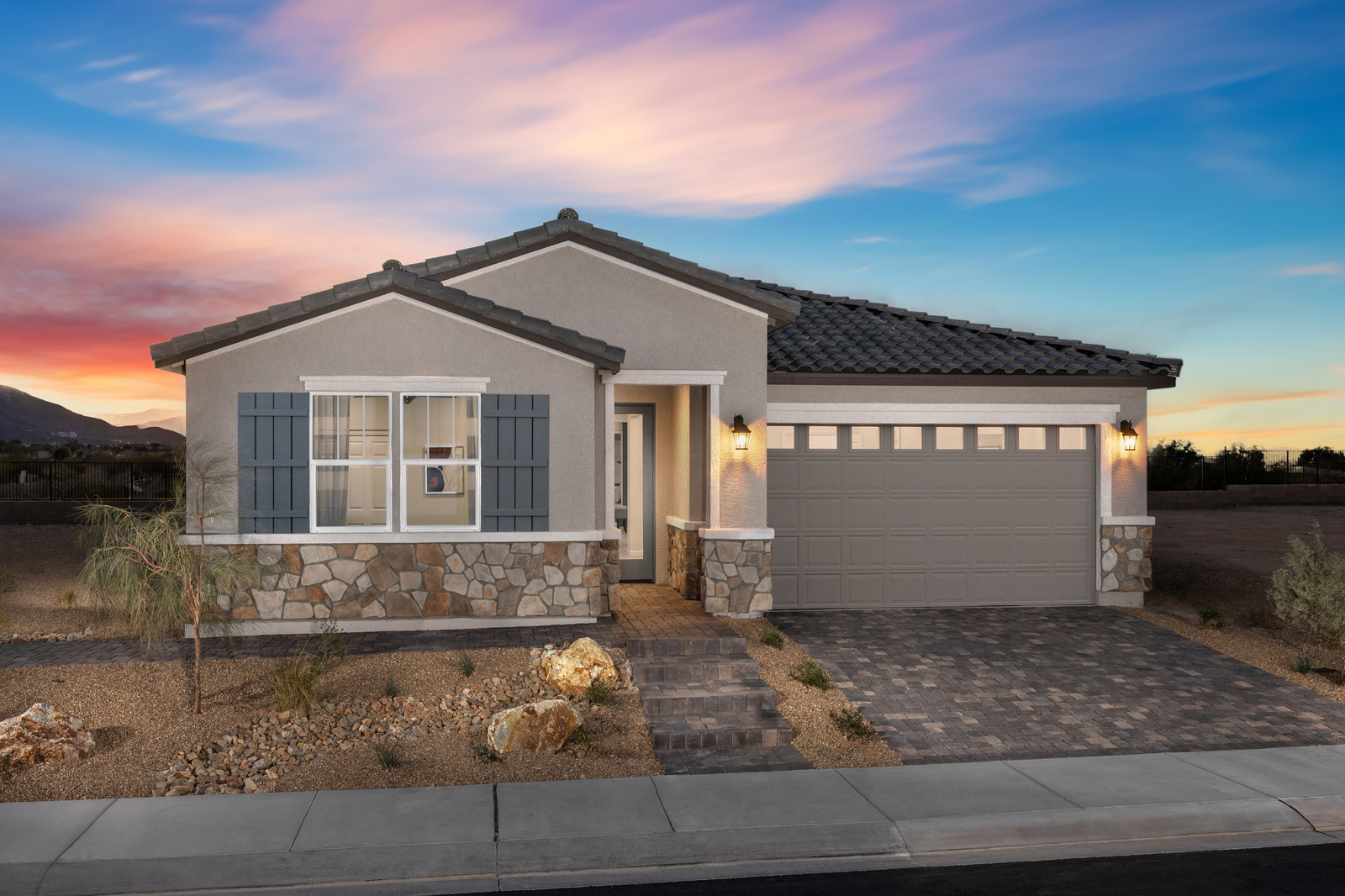 desert landscaping and stone driveway