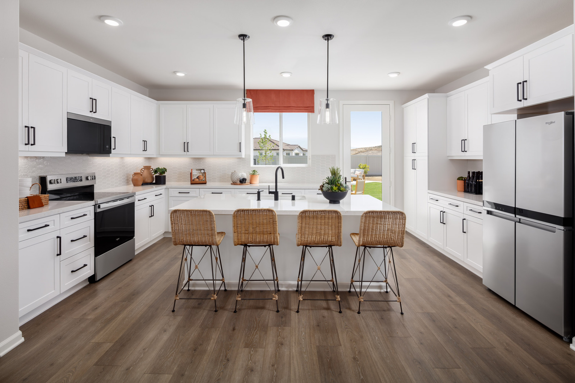 kitchen with large windows and large island