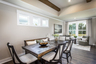 dining room with hard surface flooring and windows