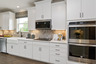 kitchen with white cabinets and stainless steel appliances