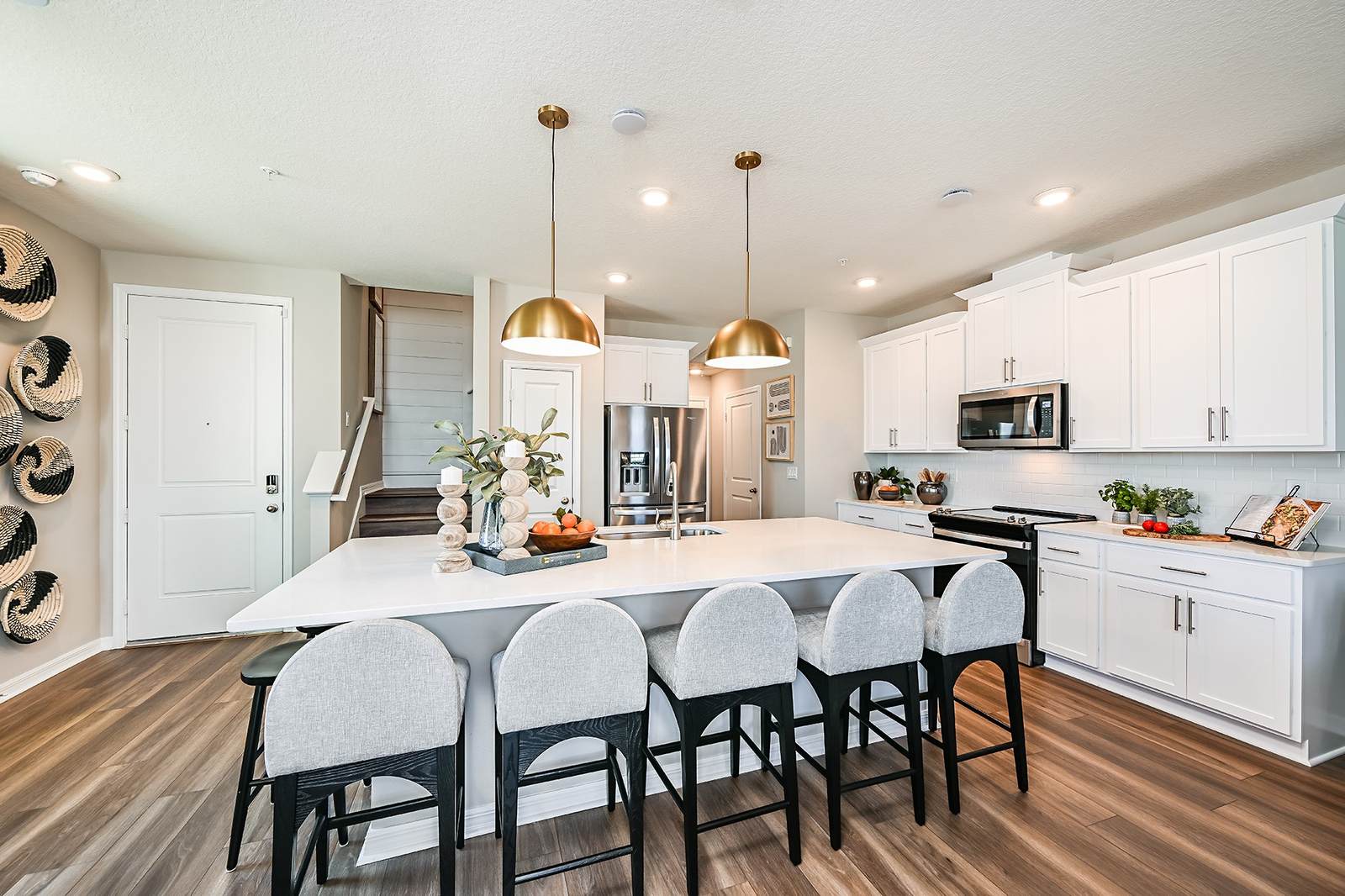 kitchen with white cabinets and white countertops