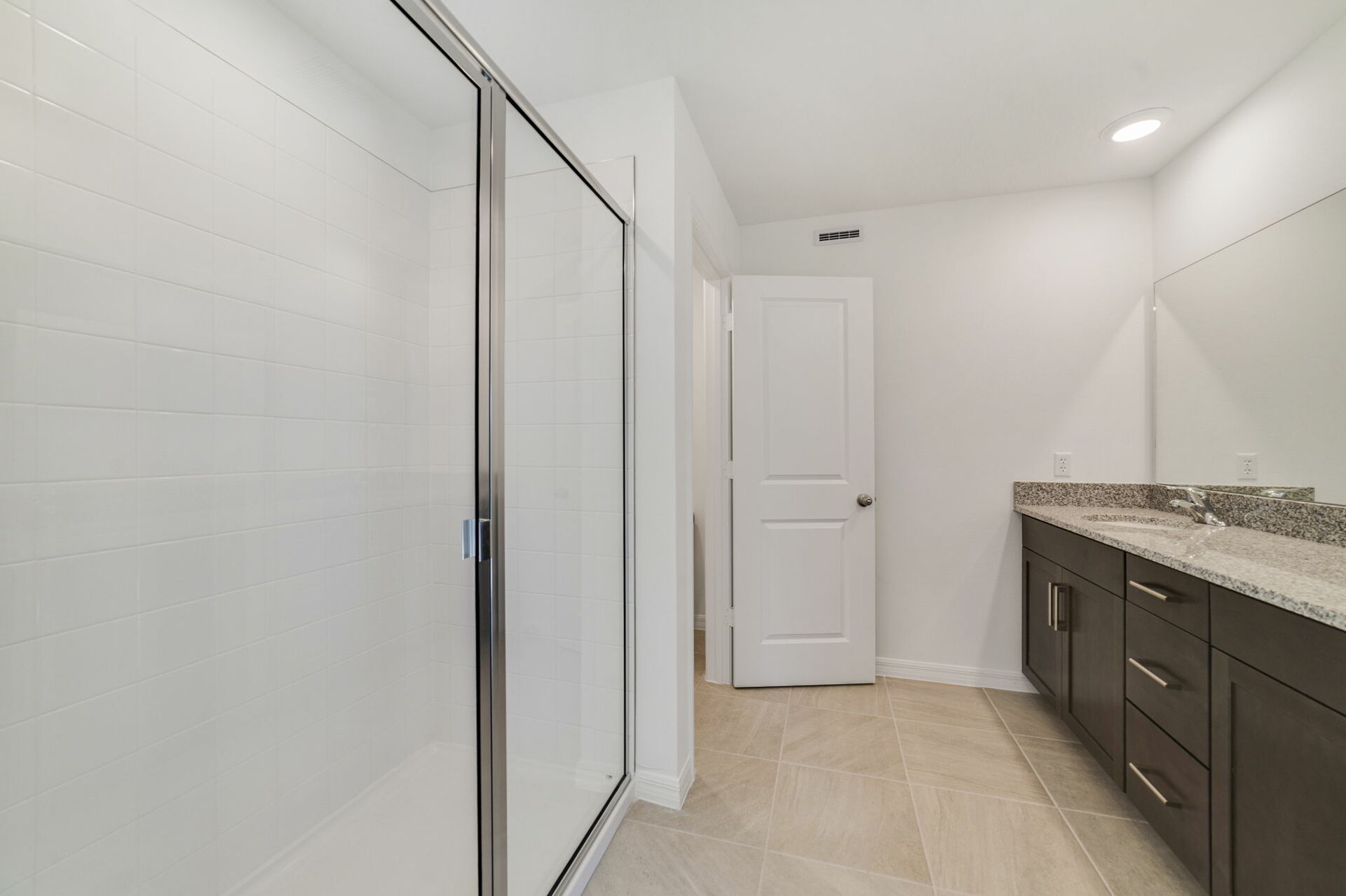 dual sink vanity with shower and mirror 