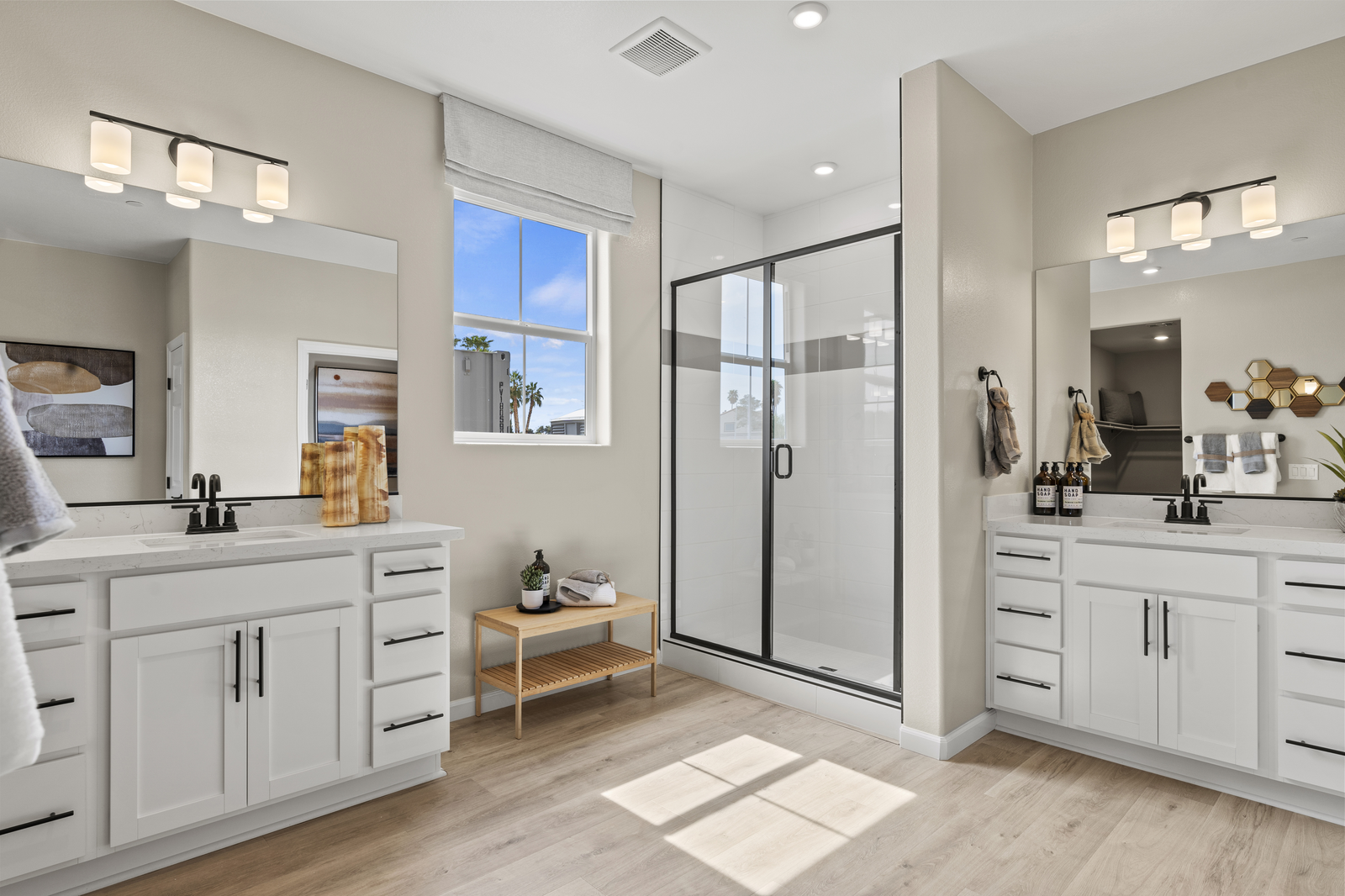 bright primary bathroom with walk-in shower