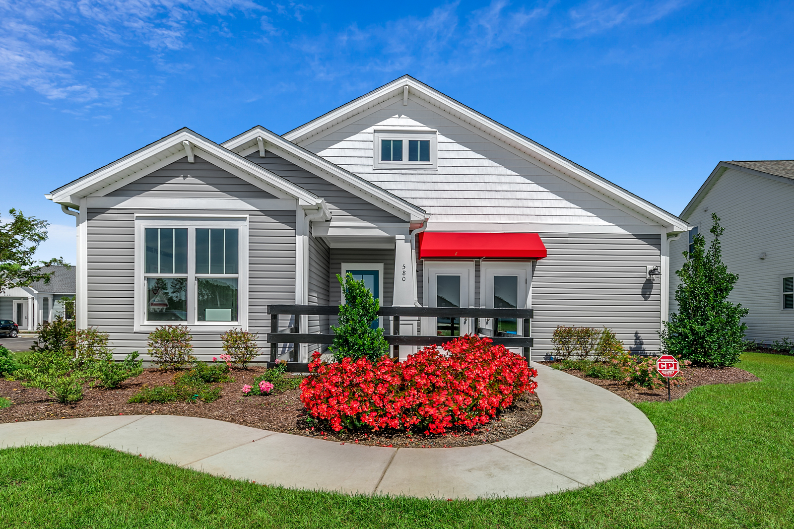 gray exterior vinyl siding with white trim