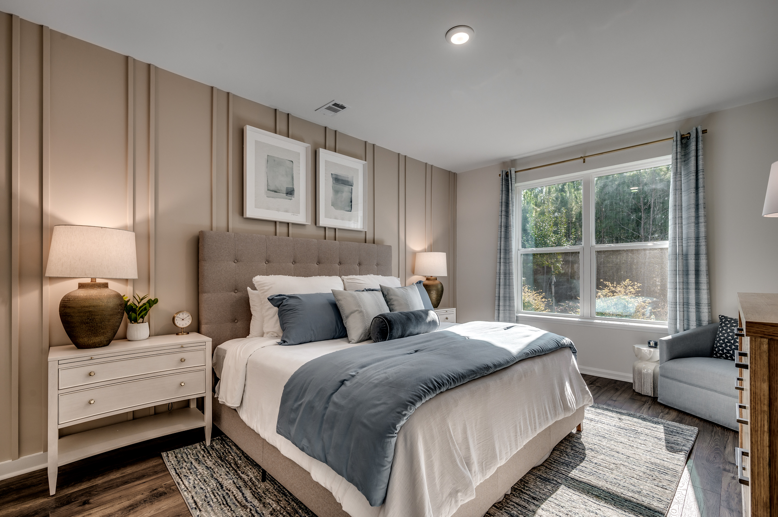 tan walls with large windows for natural lighting